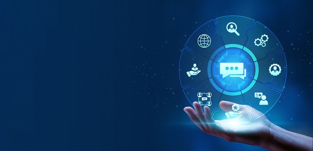 Hand holding a glowing customer service interface