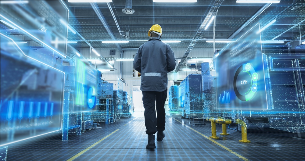 Technician walking through a smart factory