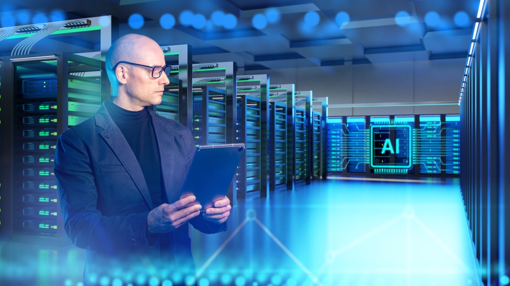 Engineer supervising AI-powered infrastructure in a data centre