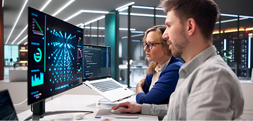 Colleagues collaborating on a GenAI-driven automation workflow
